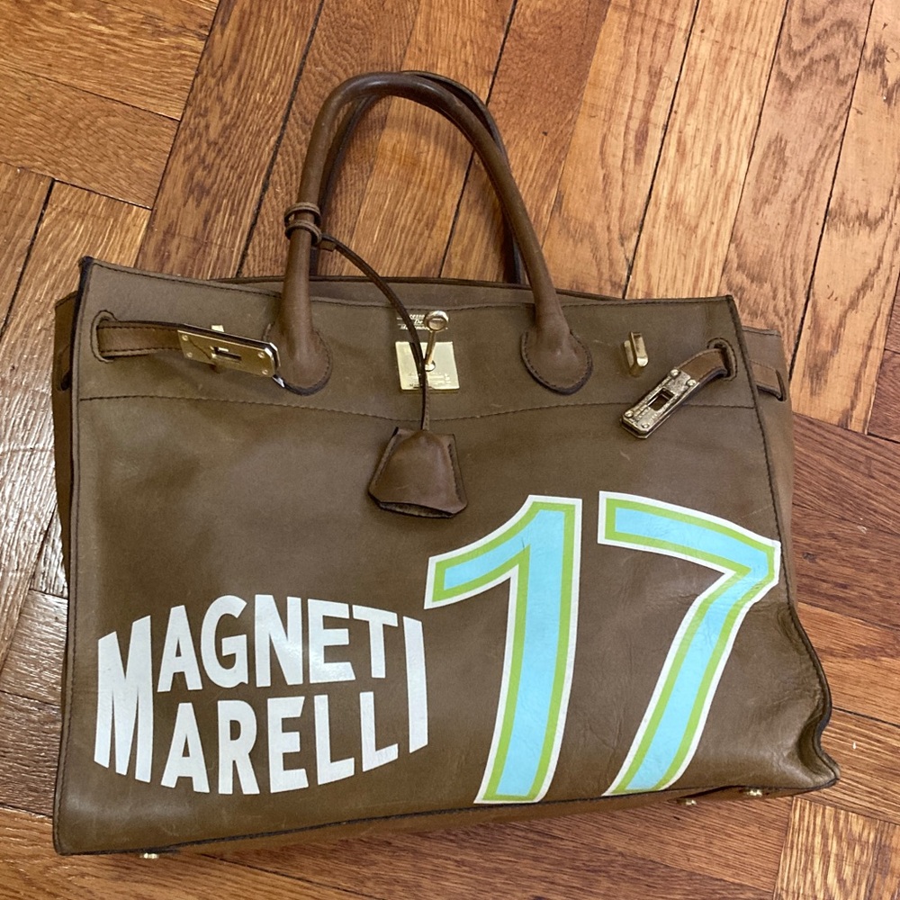 Accessoires De Mademoiselle Brown Leather bag with writing
